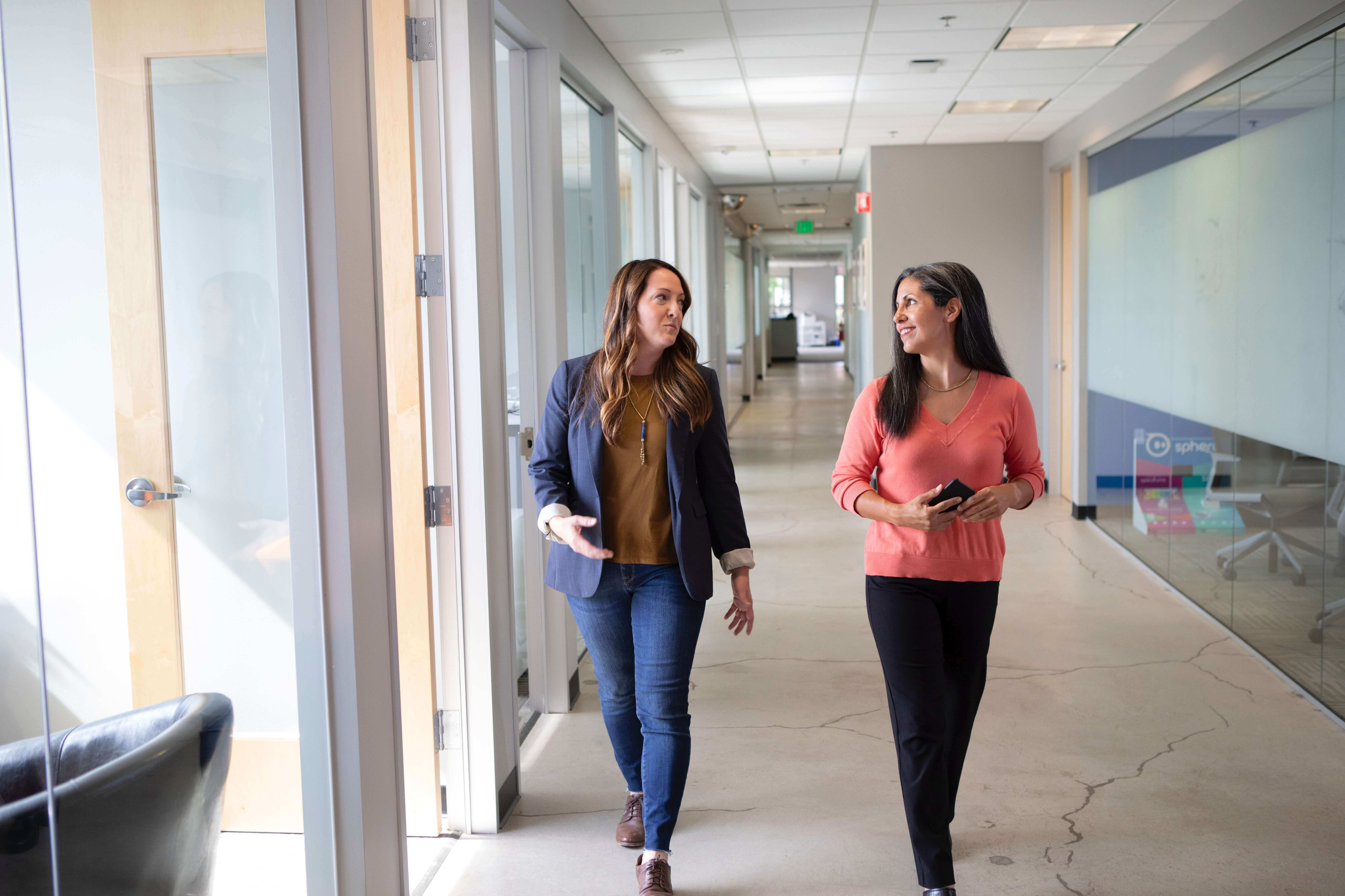 Two women walking
